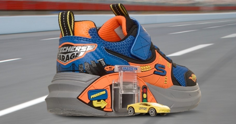 a kids Skechers shoe with a garage in the sole and a mini car beside it