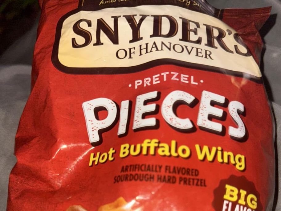 Snyders pretzel bag on top of the floor