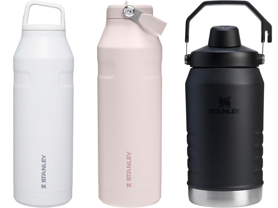 white, pink, and black stanley water bottles 