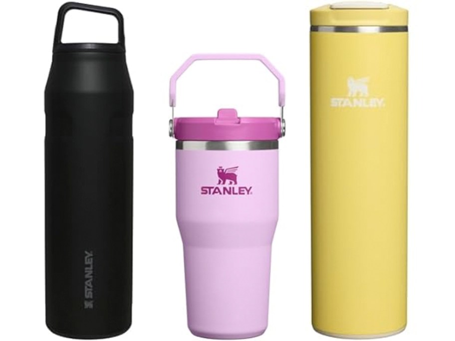 black, pink, and yellow stanley tumblers and water bottles