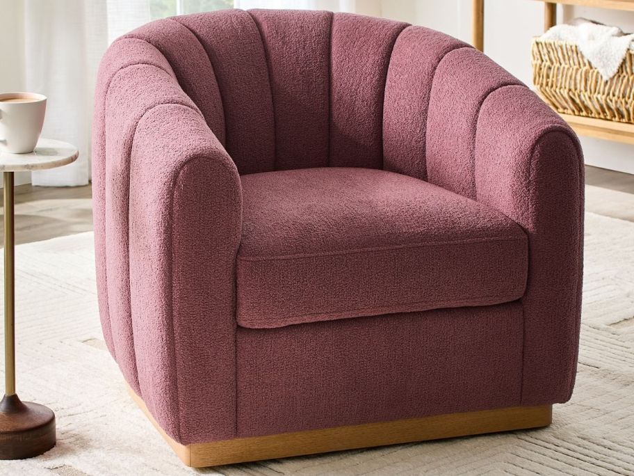 swivel purple chair in the living room 