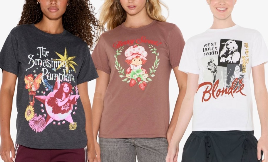 three women wearing short sleeve graphic tees