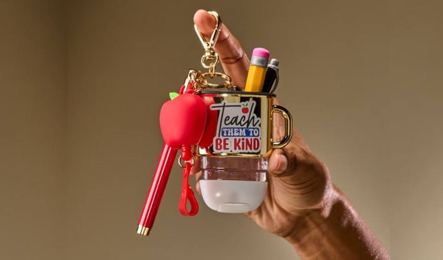 hand holding teacher's pocketbac holder