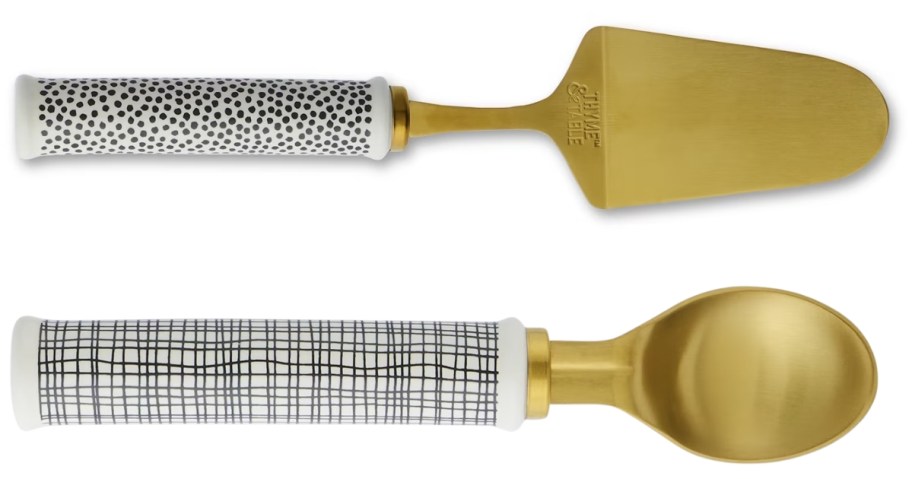 a black white and gold pie server and ice cream scoop
