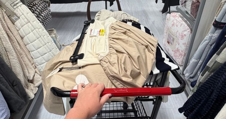 cart filled with clearance clothing in tj maxx store