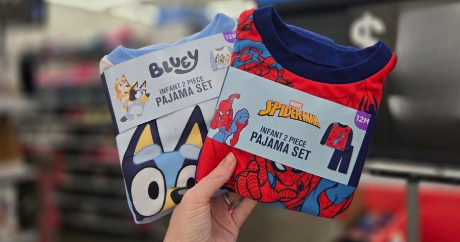two character pajama sets in hand in store
