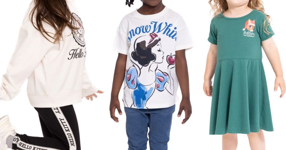 three girls wearing character clothing