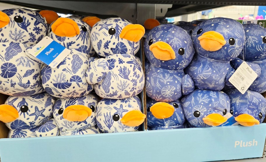 white and blue ocean plush ducks 