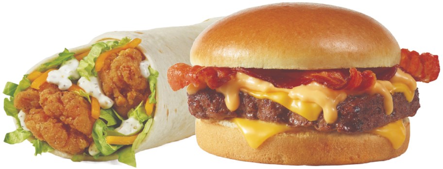 A juicy bacon cheeseburger with melted cheese sits next to a crispy chicken wrap filled with lettuce, cheddar, and ranch dressing.