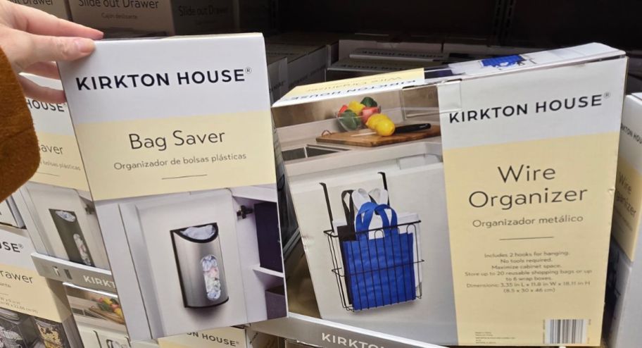 hand holding bag saver and wire organizer