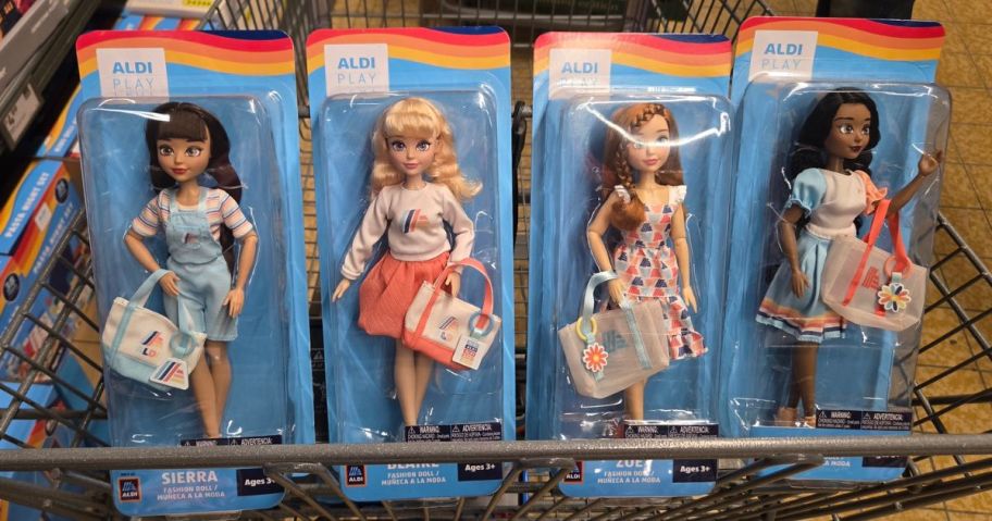 Four different ALDI play dolls 