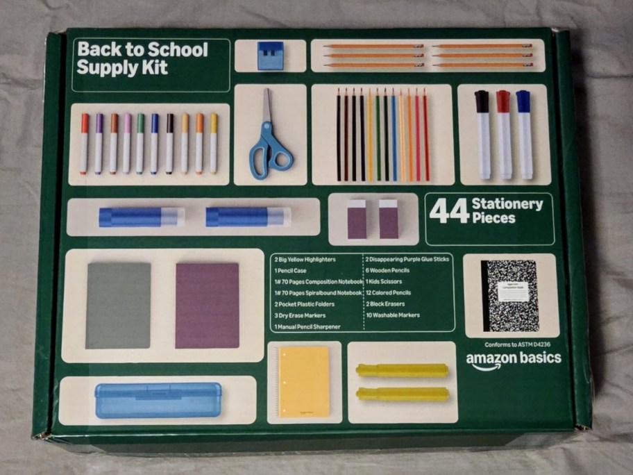box of amazon basics school supply set with gray background