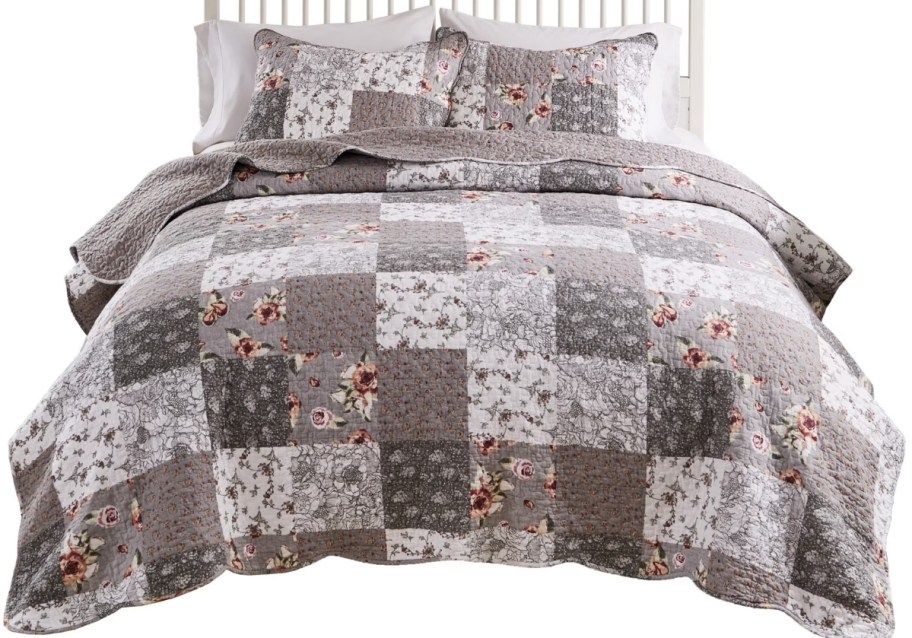 a brown patchwork quilt set
