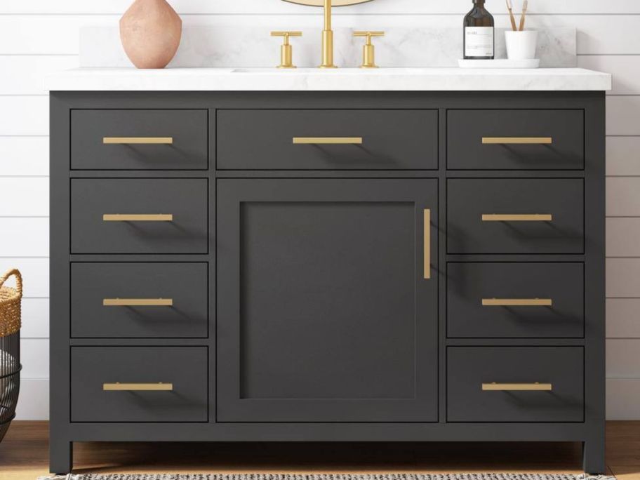 black vanity displayed in the bathroom