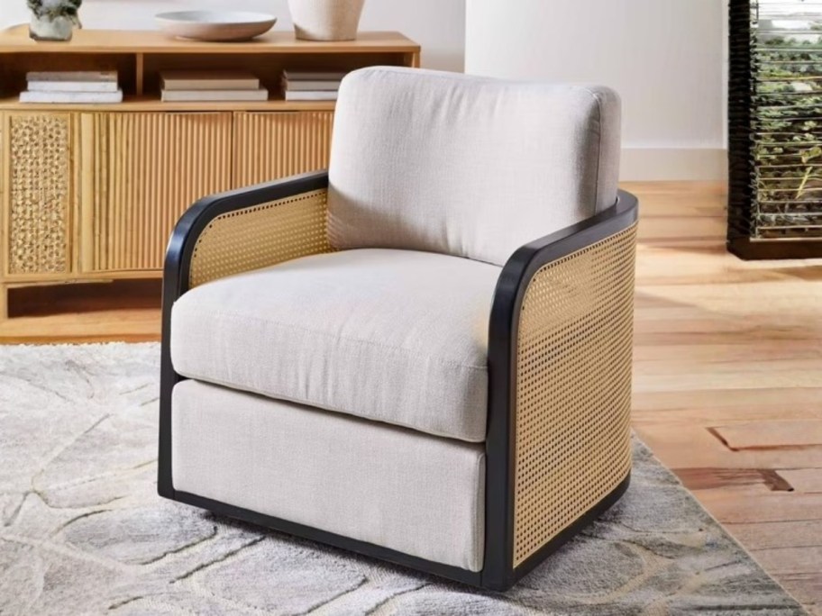 an accent chair with caning details on the side