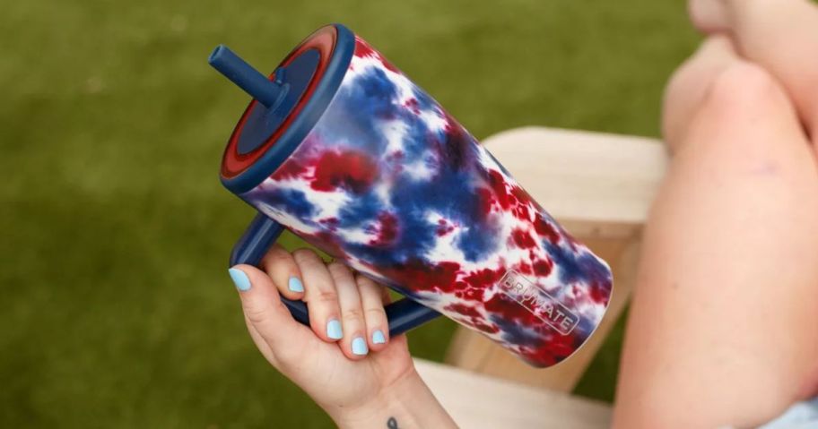 woman holding Br&uuml;Mate Era 40oz Straw Tumbler