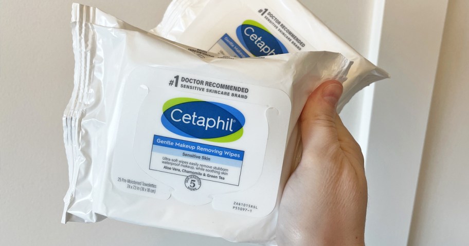 hand holding up two packs of Cetaphil Gentle Makeup Remover Wipes