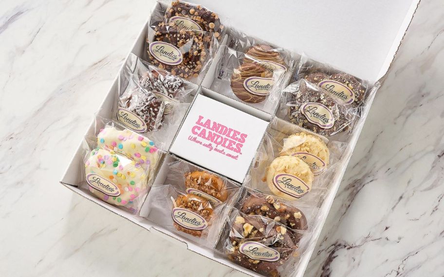 opened box with cookies inside of it 