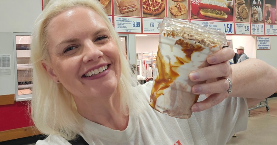 Costco Caramel churro sundae being held by a smiling woman