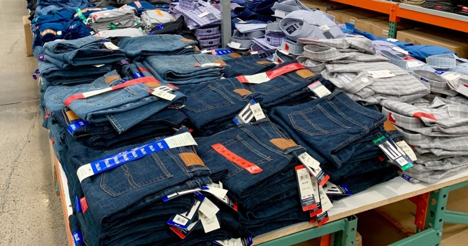 men's jeans and button down shirts on display at costco store