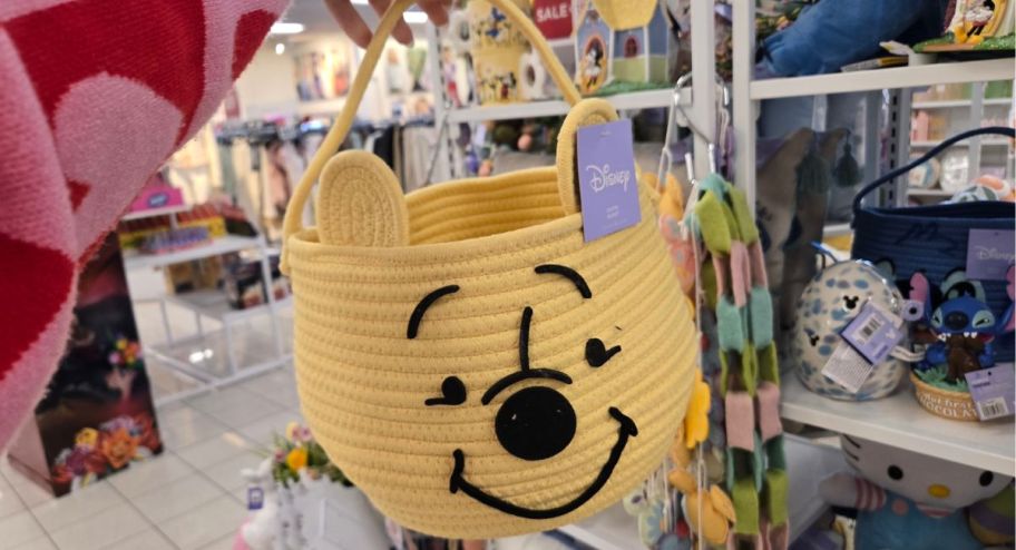 Pooh easter basket in persons hand