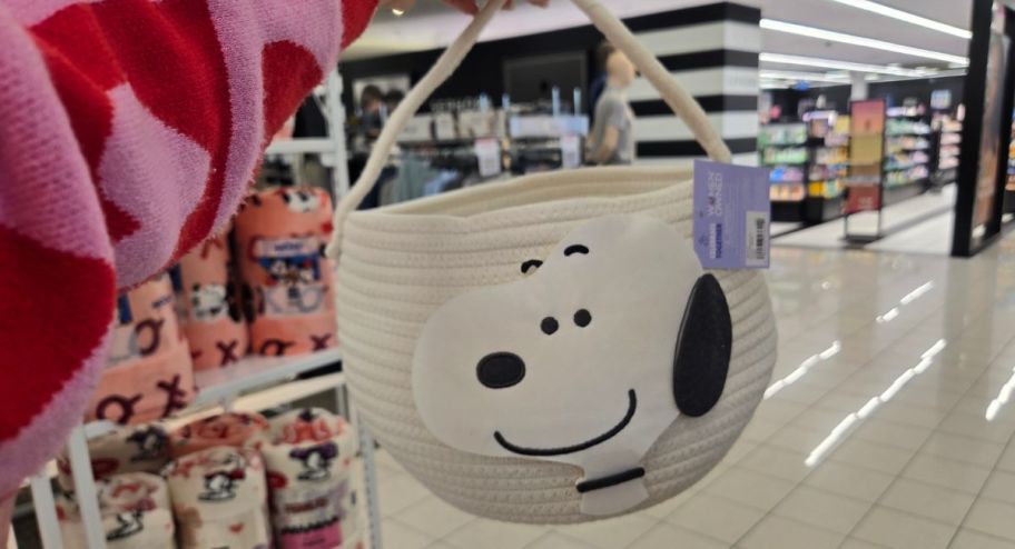 hand holding Easter baskets snoopy