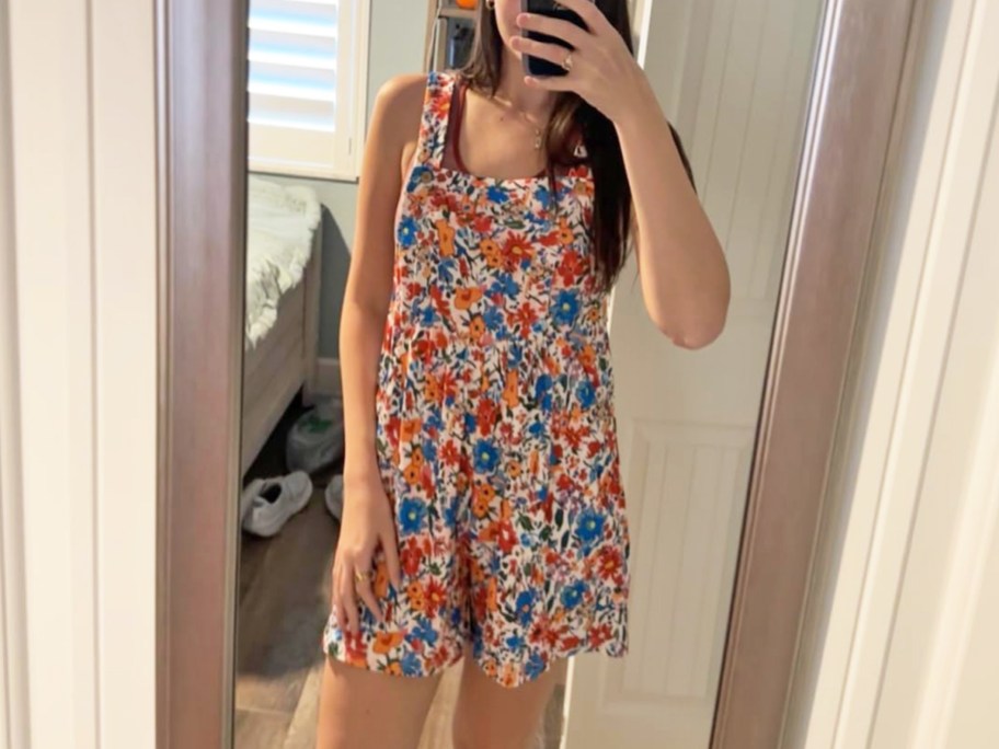 woman wearing a floral print romper