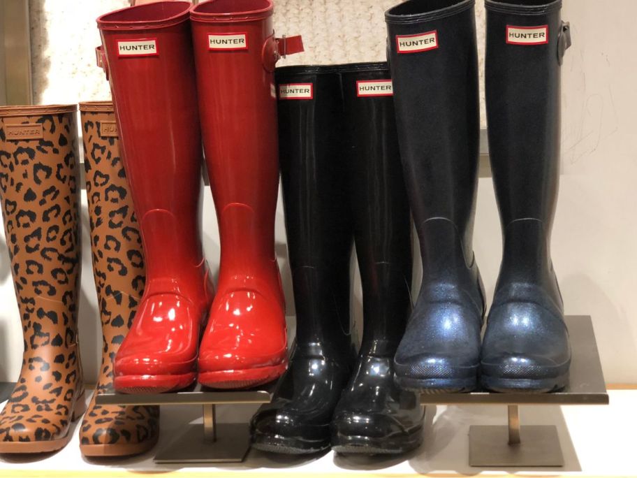 Tall Hunter Rain Boots for women on display at a store in various colors