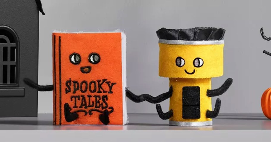 felt scary story and flashlight figurines holding hands