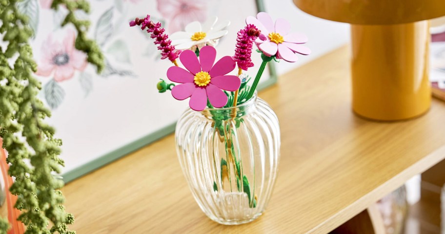 pink and white lego flowers in a vase