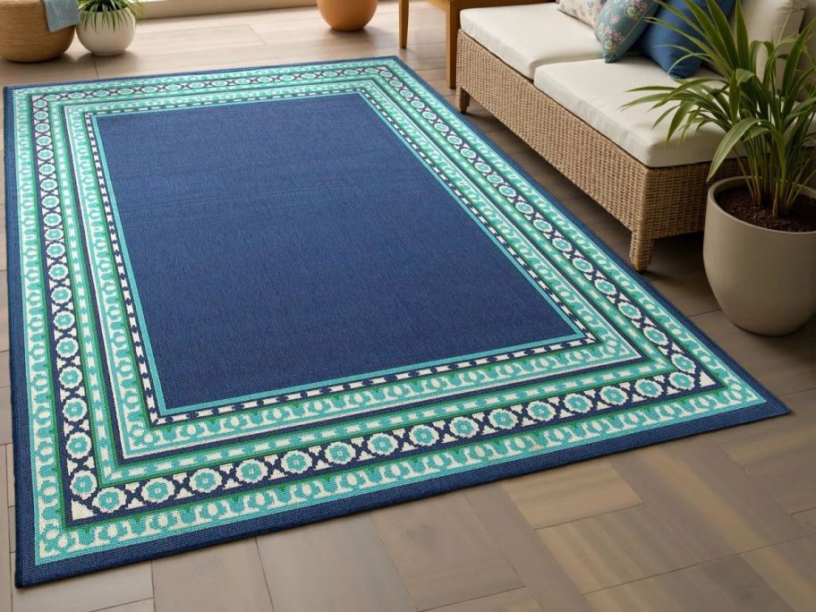 Lark Manor Deltana 5'3" x 7'6" Area Rug in living room