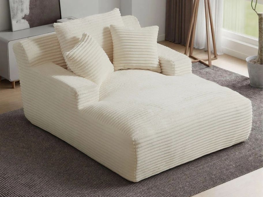 beige sleeper sofa lounger in living room