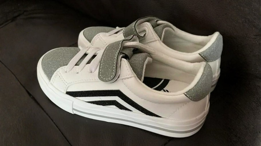 a pair of kids white & graysneakers