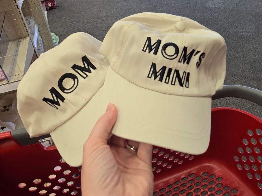 mom and mom mini hats in hand in store