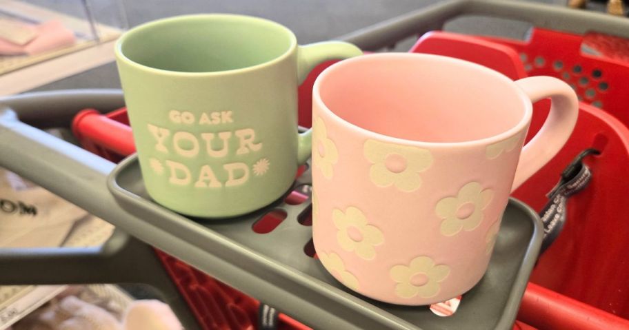 two mother's day mugs on cart in store