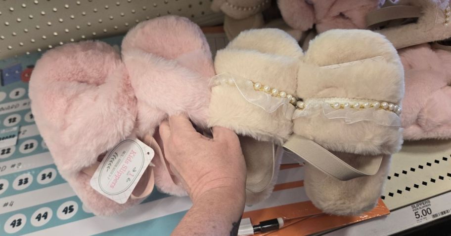slippers in hand in store