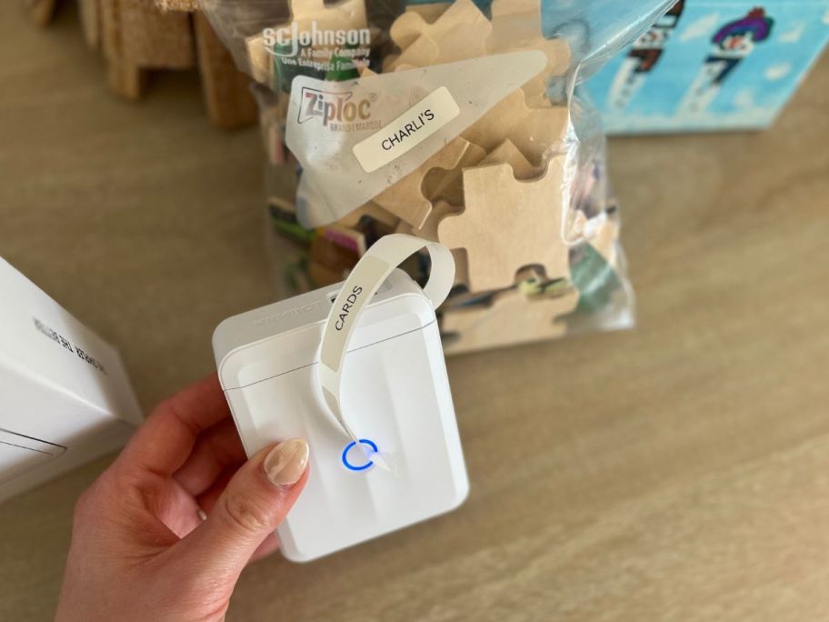 sara holding Wireless Label Maker