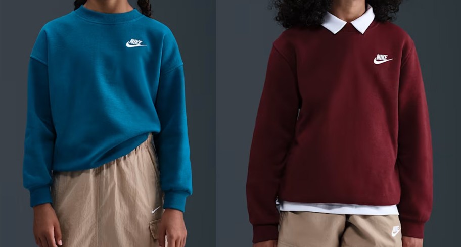 two kids in blue and maroon nike sweatshirts
