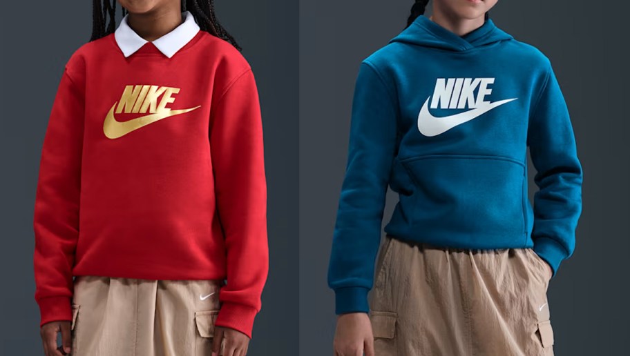 two kids in red and blue nike sweatshirts