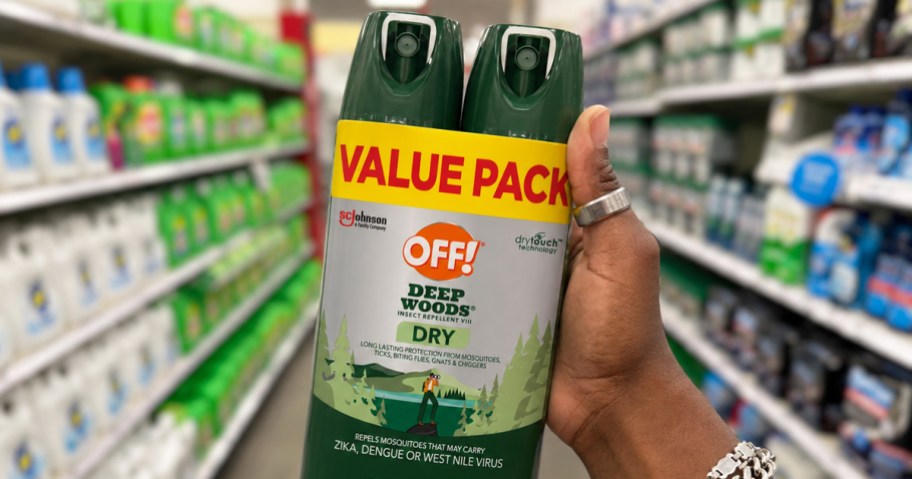 hand holding up a 2-pack of OFF! Deep Woods Insect Repellent in store