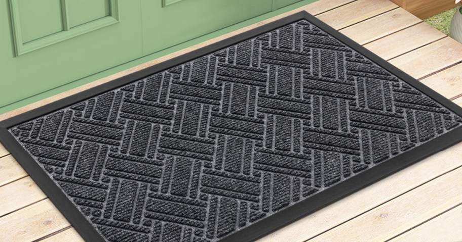 grey doormat on a deck