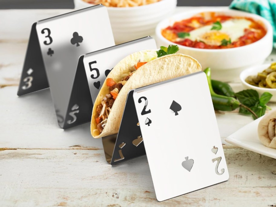 taco in taco holder shaped like playing cards