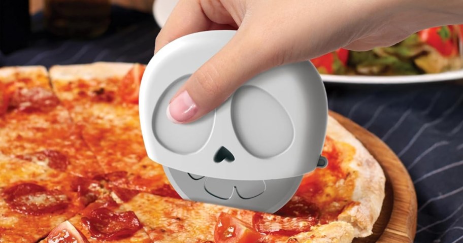 Slice Reaper Pizza Cutter Wheel cutting a pizza