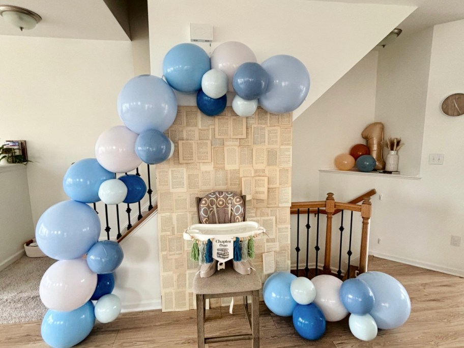 Blue and white PartyAire Balloon Arch Kit over a high chair