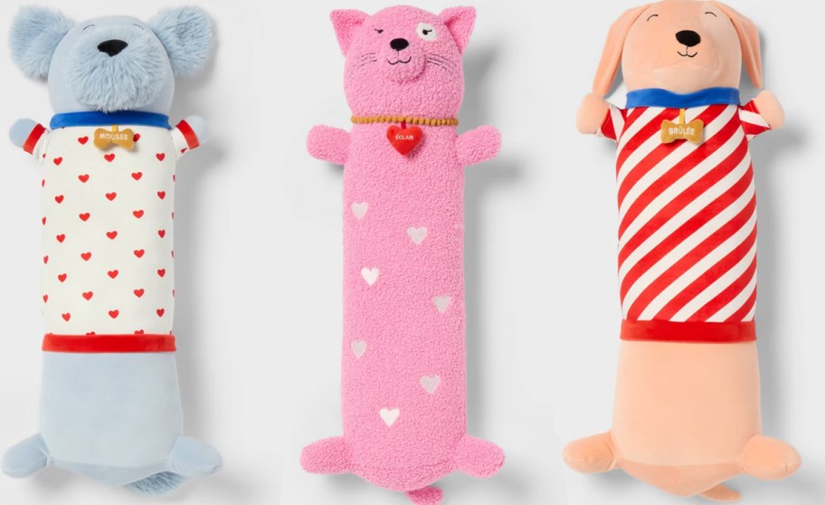 three long dog and cat weighted plush pillows