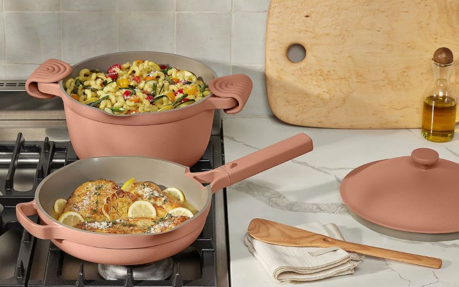 Our place home pans and grips on top of the stove