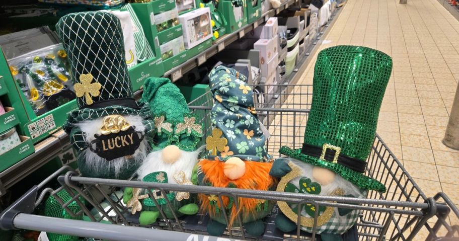 shopping cart filled with st patties gnomes
