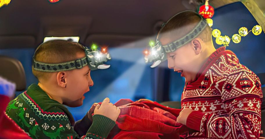 kids wearing Triceratops LED Headlamps