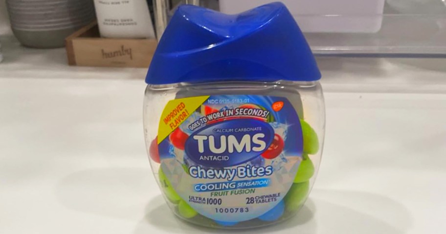 bottle of TUMS Chewy Bites on counter