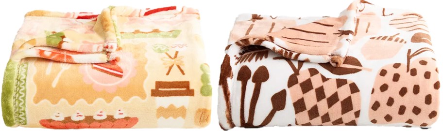 two folded fall print throw blankets